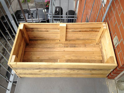 The planter finalized and installed on the balcony.