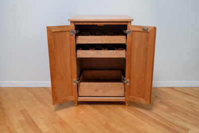 Front view of the piece with the doors open.